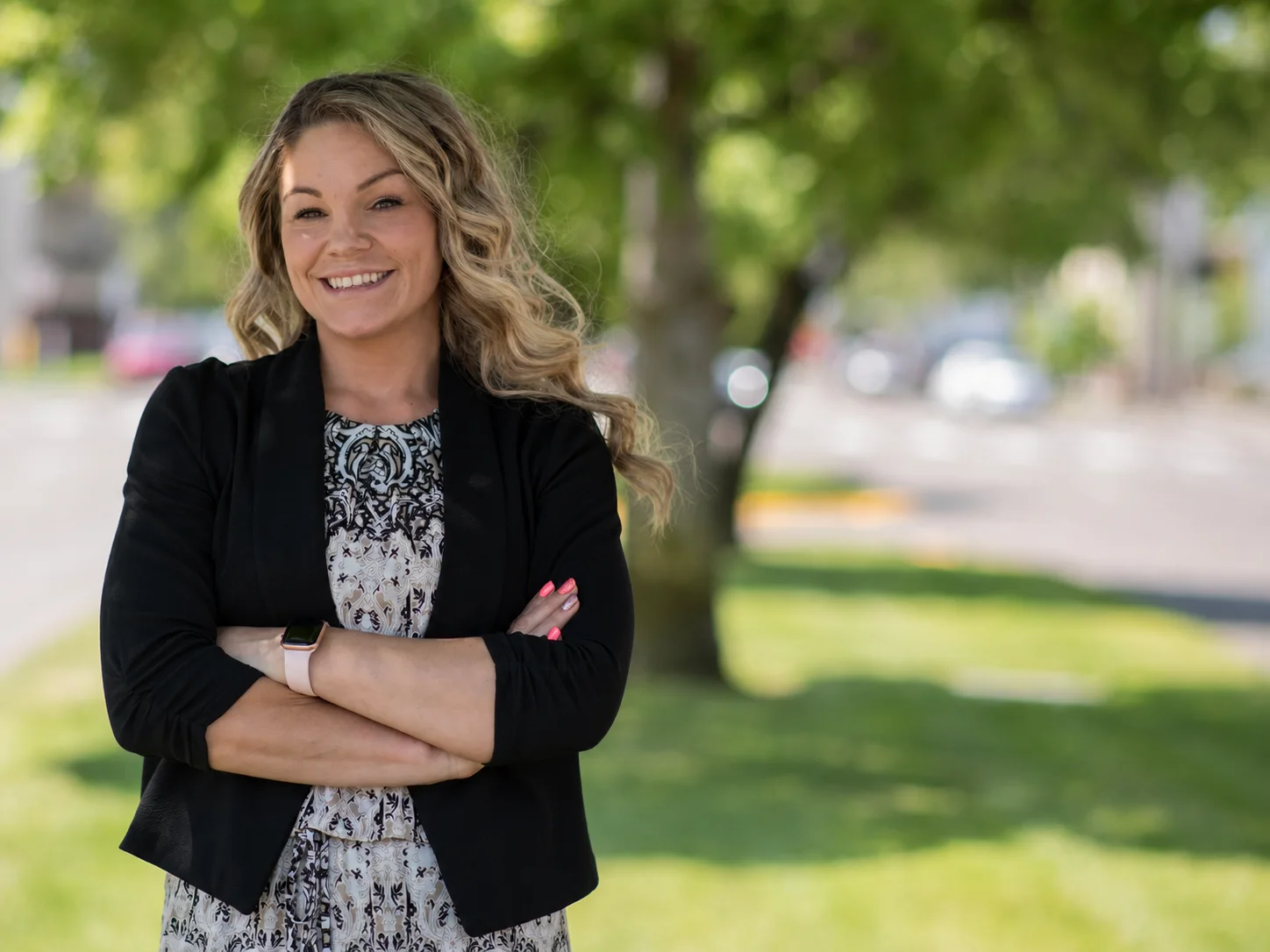 Brandy Kays, Outside Sales Representative for Catering and Events at 842 Group, smiling outdoors